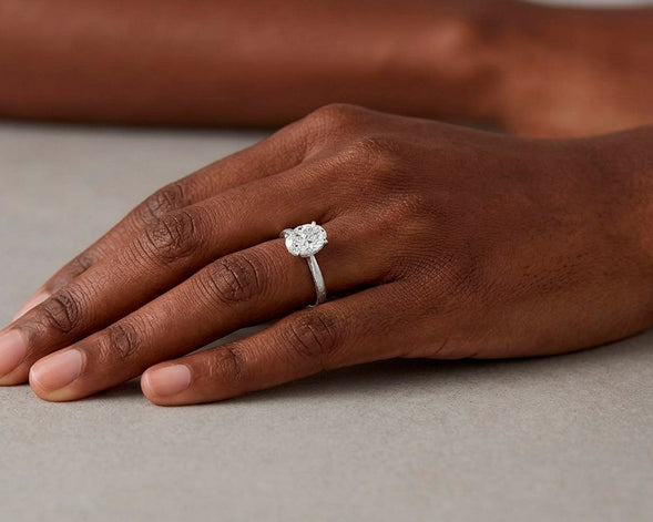 14k Gold Diamond Solitaire Ring with Oval-Cut Center Stone 0.60ct