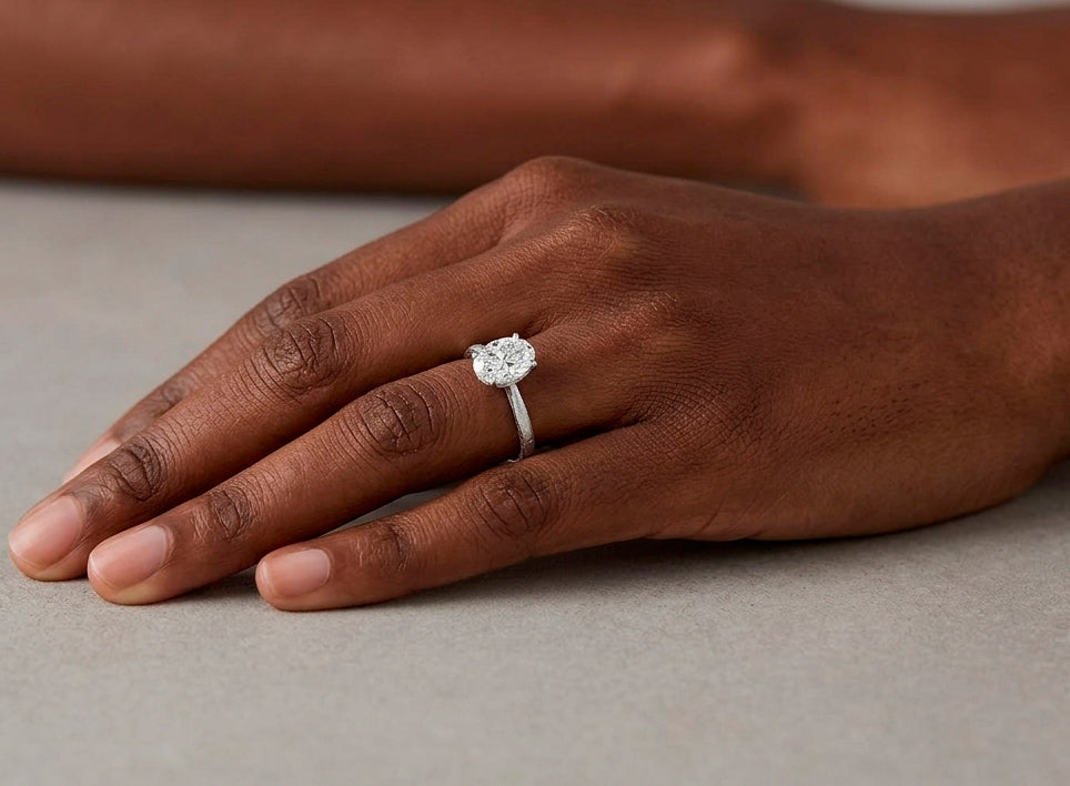 14k Gold Diamond Solitaire Ring with Oval-Cut Center Stone 0.60ct