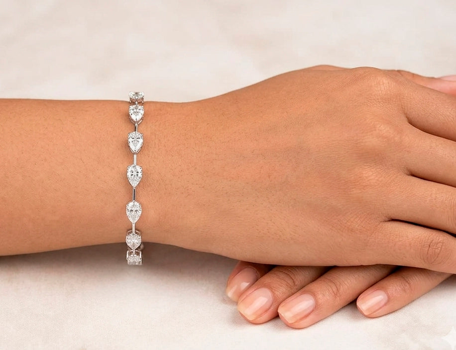 14k Gold Diamond Tennis Bracelet with Pear-Shape Solitaire Links 9.64ct