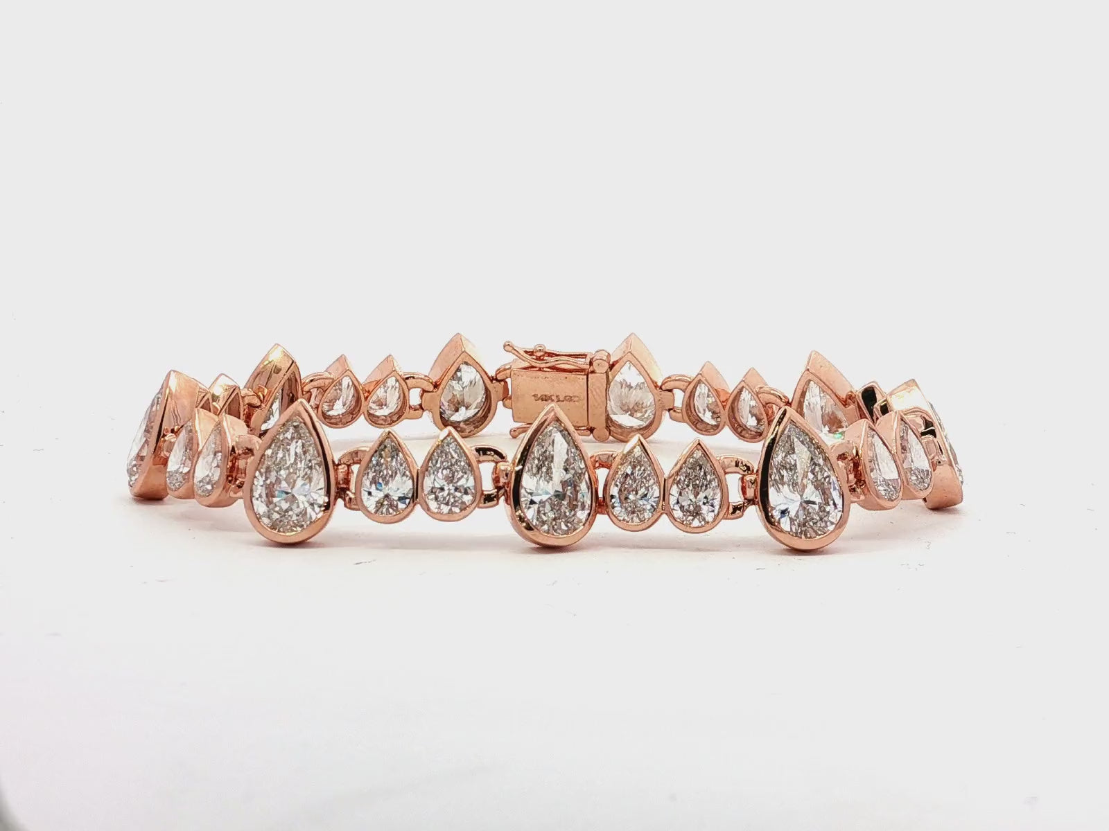 14k Gold Diamond Bracelet with Graduated Pear-Shape Design 22.98ct